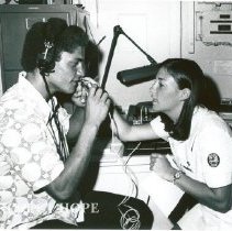 Gwen Orr, Audiologist, with patient on SS HOPE